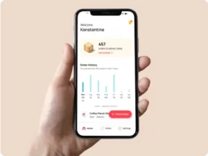 A hand holding a phone and representing app ux designed by UX Team for a client named Tinvio